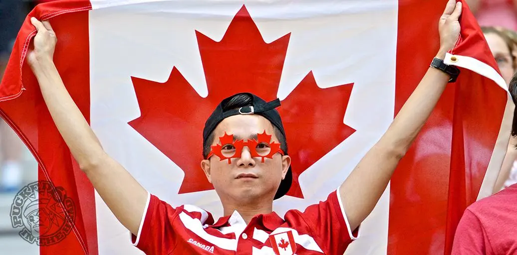IPTV free trial Canada — fan holding Canadian flag